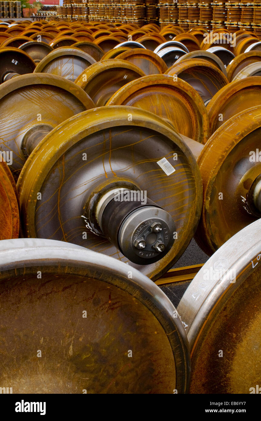 Railroad train wheel and axle assemblies at manufacturing plant,