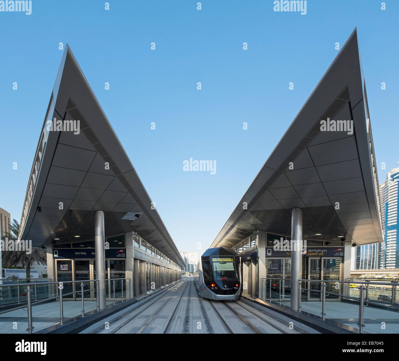 Station and tram on new Dubai Tram system in Marina district of Dubai United Arab Emirates Stock Photo