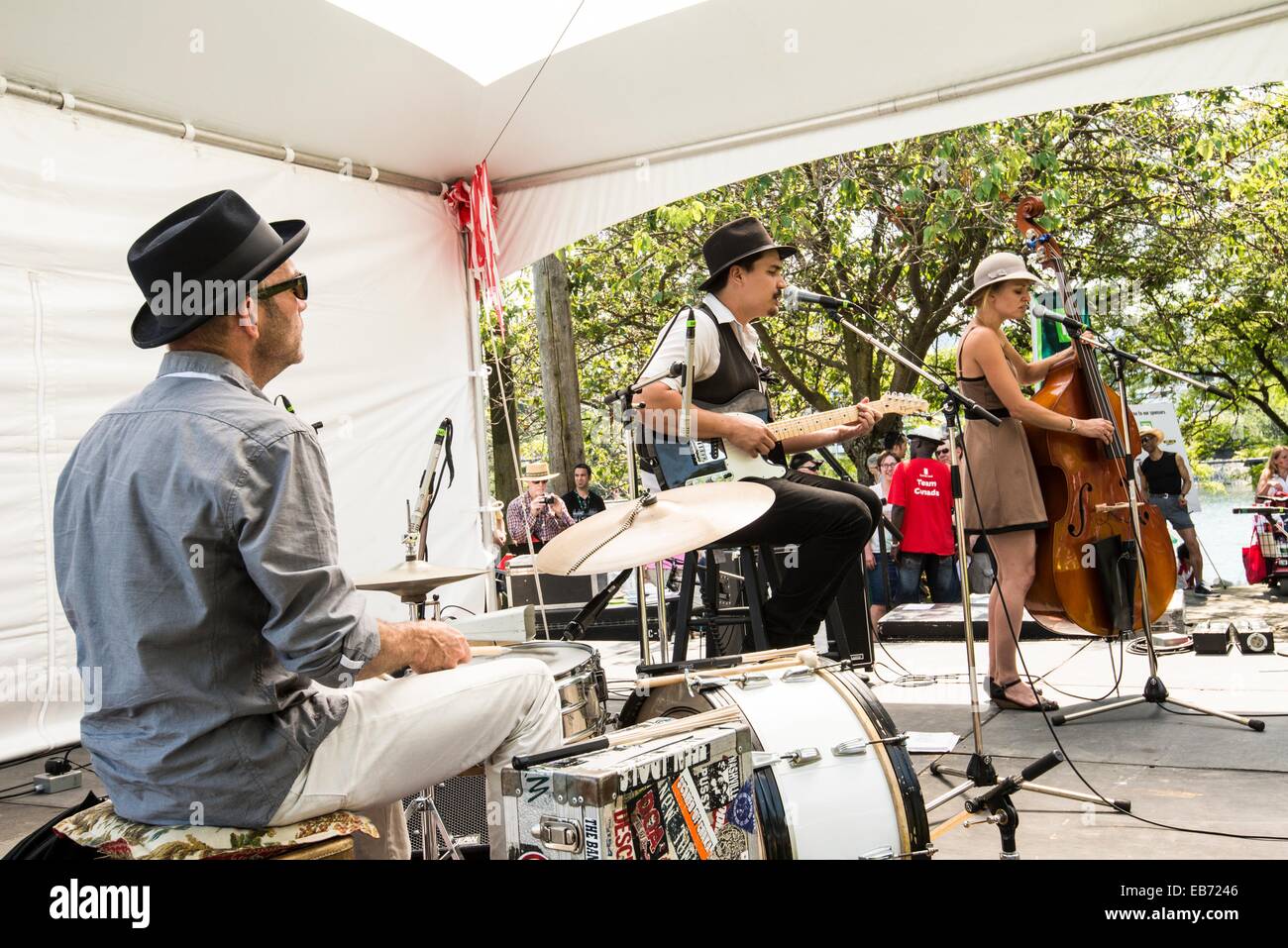 a trio jazz musicians performs on Canada Day at the TD Vancouver
