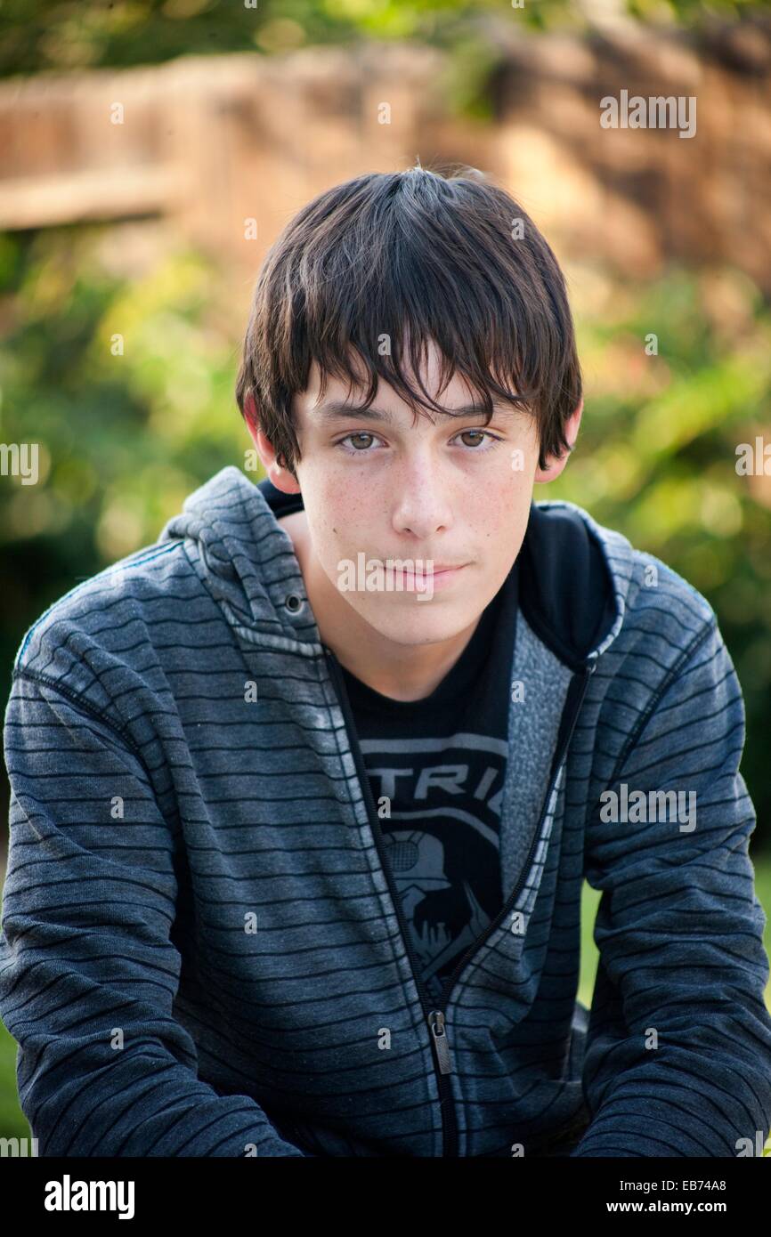 young man looking at the camera Stock Photo - Alamy