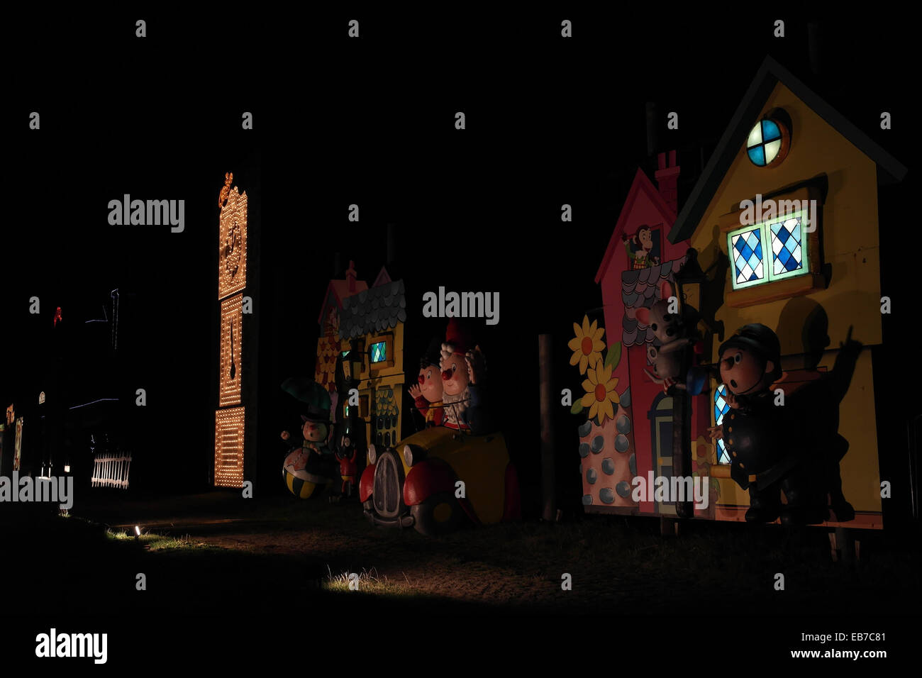 Night oblique view Toytown PC Plod, Noddy Big Ears sitting car, Mr Wobbly Man, Noddy Tableau, Blackpool Illuminations, UK Stock Photo