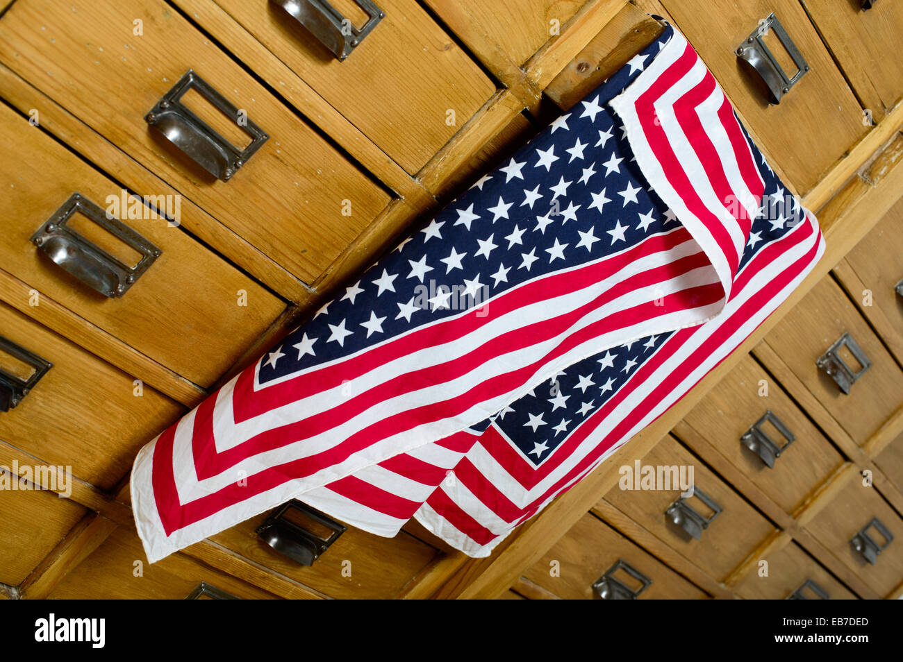 American flag out of the drawer of a cabinet Stock Photo