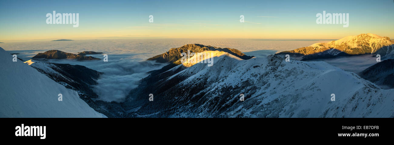Sunset mountains above clouds - Tatra Mountains in Poland Stock Photo ...