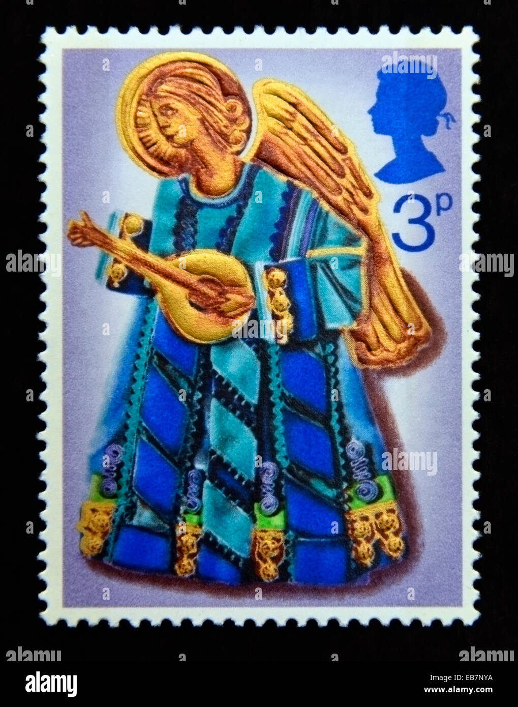 Postage stamp. Great Britain. Queen Elizabeth II. Christmas 1972. Angel playing Lute. 3p. Stock Photo