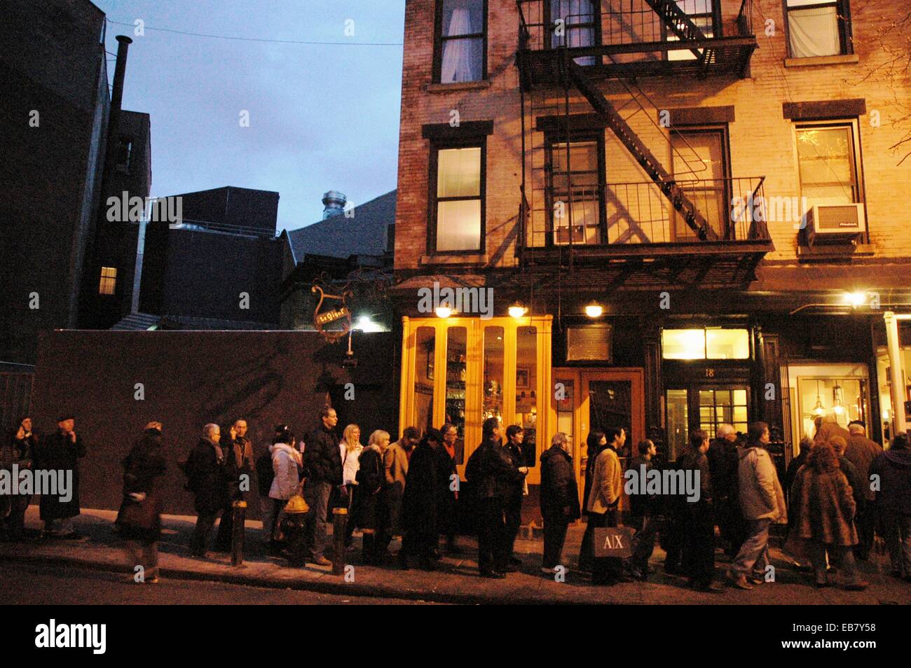 New York City, long line of people waiting to enter a small oyster