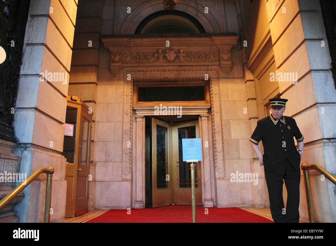New York City, doorman at a door of the Plaza Hotel, Manhattan Stock