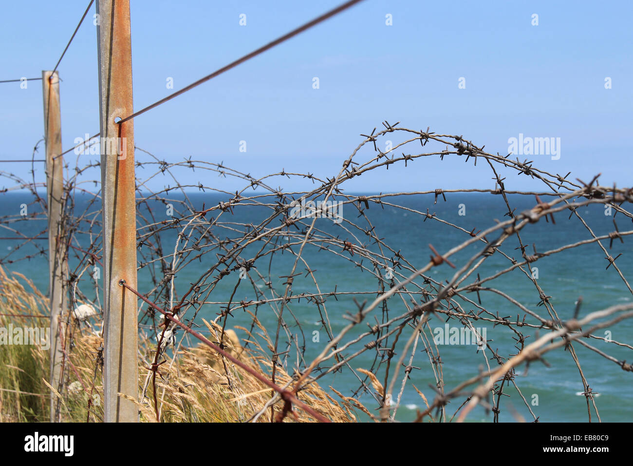 Barbed wire were placed along the Atlantic coast at the Pointe du Hoc (France). Stock Photo