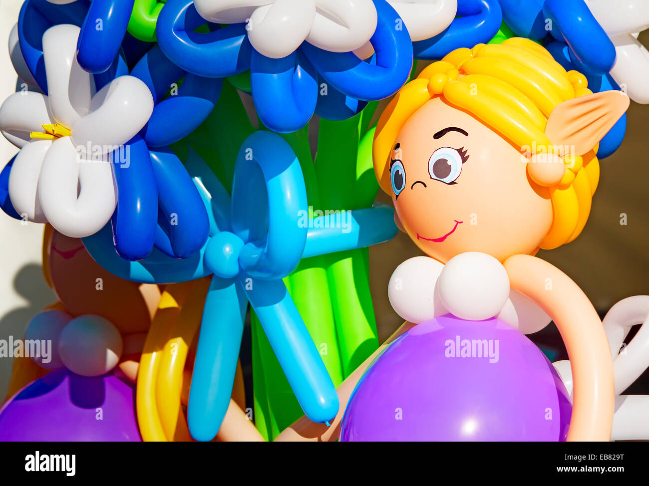 Funny doll and other inflatable toys, serve as decoration for the holiday. Stock Photo
