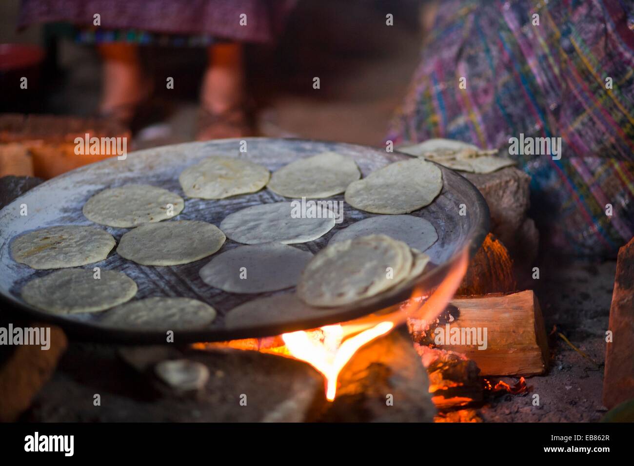 Guatemala, San Jose Poaquil, Tortillas on clay comal Stock Photo