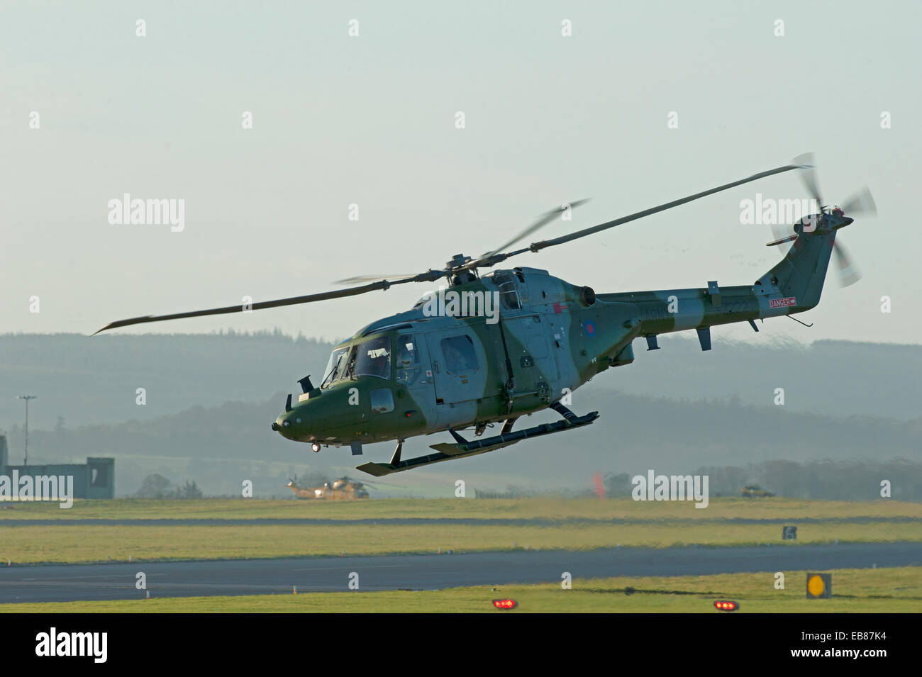 British Army Westland Lynx WG-13 AH7 Helicopter XZ222 lifting off at RAF Lossiemouth   SCO 9232. Stock Photo