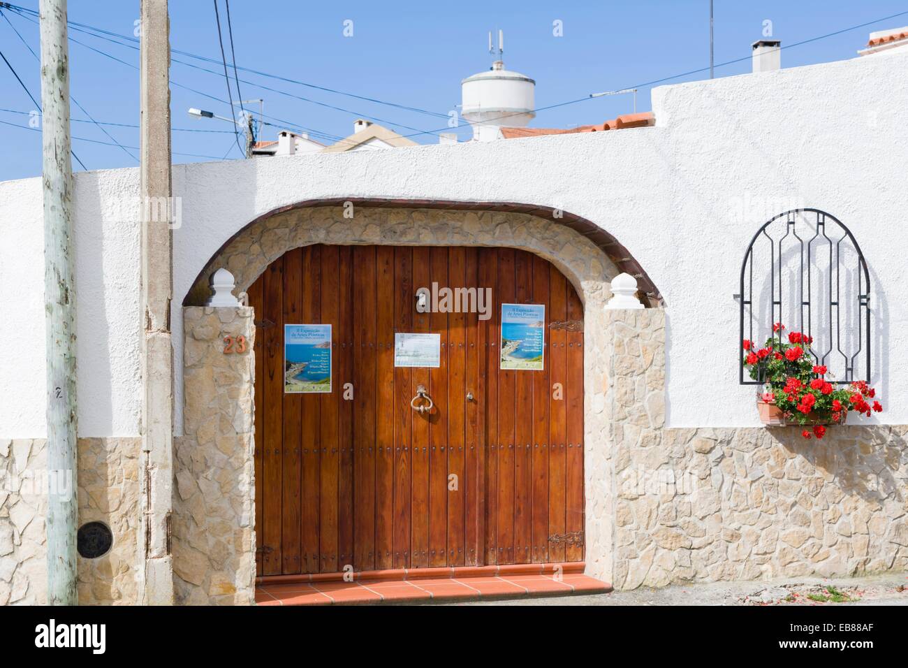Gate of traditional white building, Sao Martinho do Porto, Alcobaca, Oeste, Leiria District, Portugal. Stock Photo