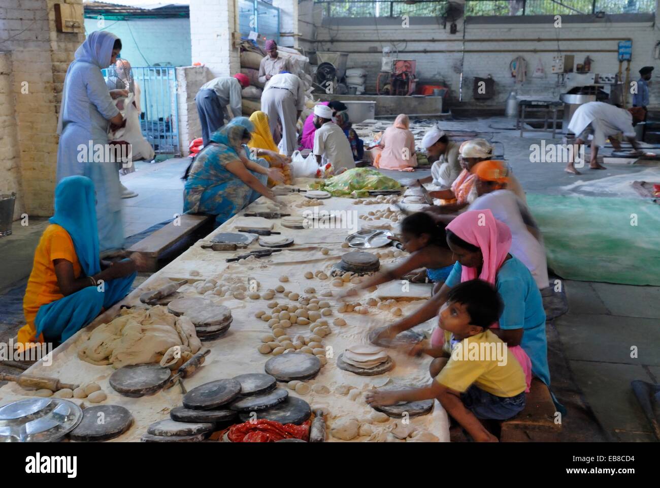 preparation chapati in the canteen called Langar where food is served in Gurdwara to all the