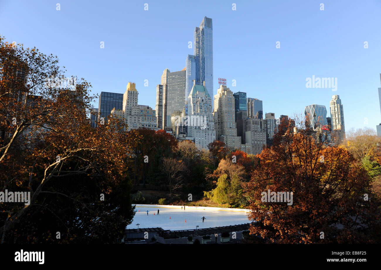 Manhattan New York USA November 2014  - The Essex House hotel on south side of Central Park with ice rink in foreground Stock Photo