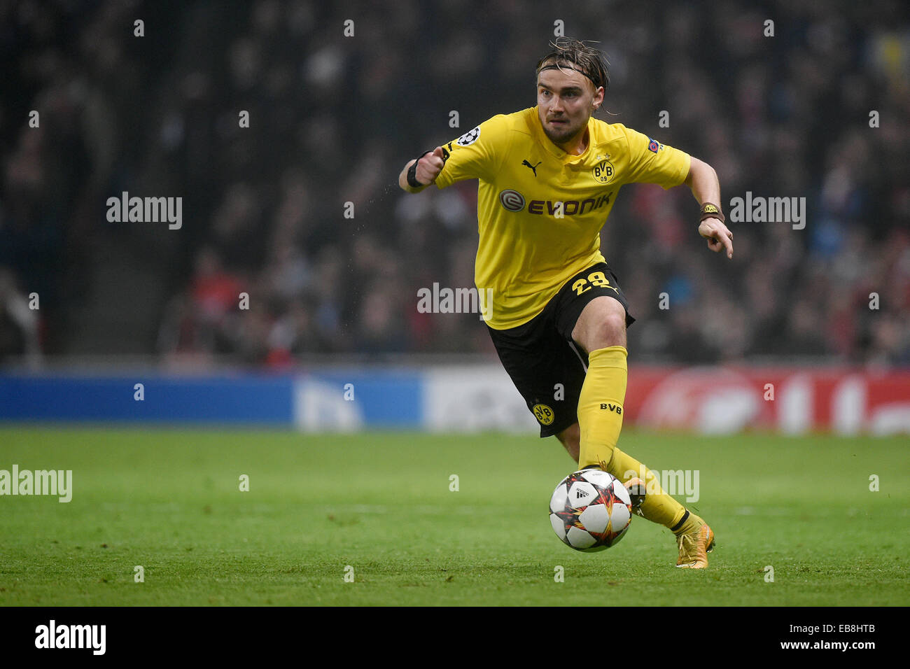 26.11.2014. London, England.  Dortmund's Marcel Schmelzer controls the ball during the UEFA Champions League Group D soccer match between Arsenal FC and Borussia Dortmund at Emirates Stadium in London, Great Britain, 26 November 2014. Stock Photo