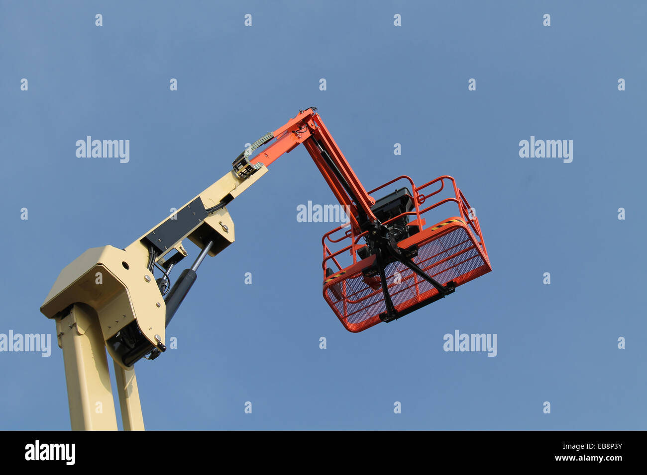 The Cage and Arm of a Mechanical Cherry Picker Lift. Stock Photo