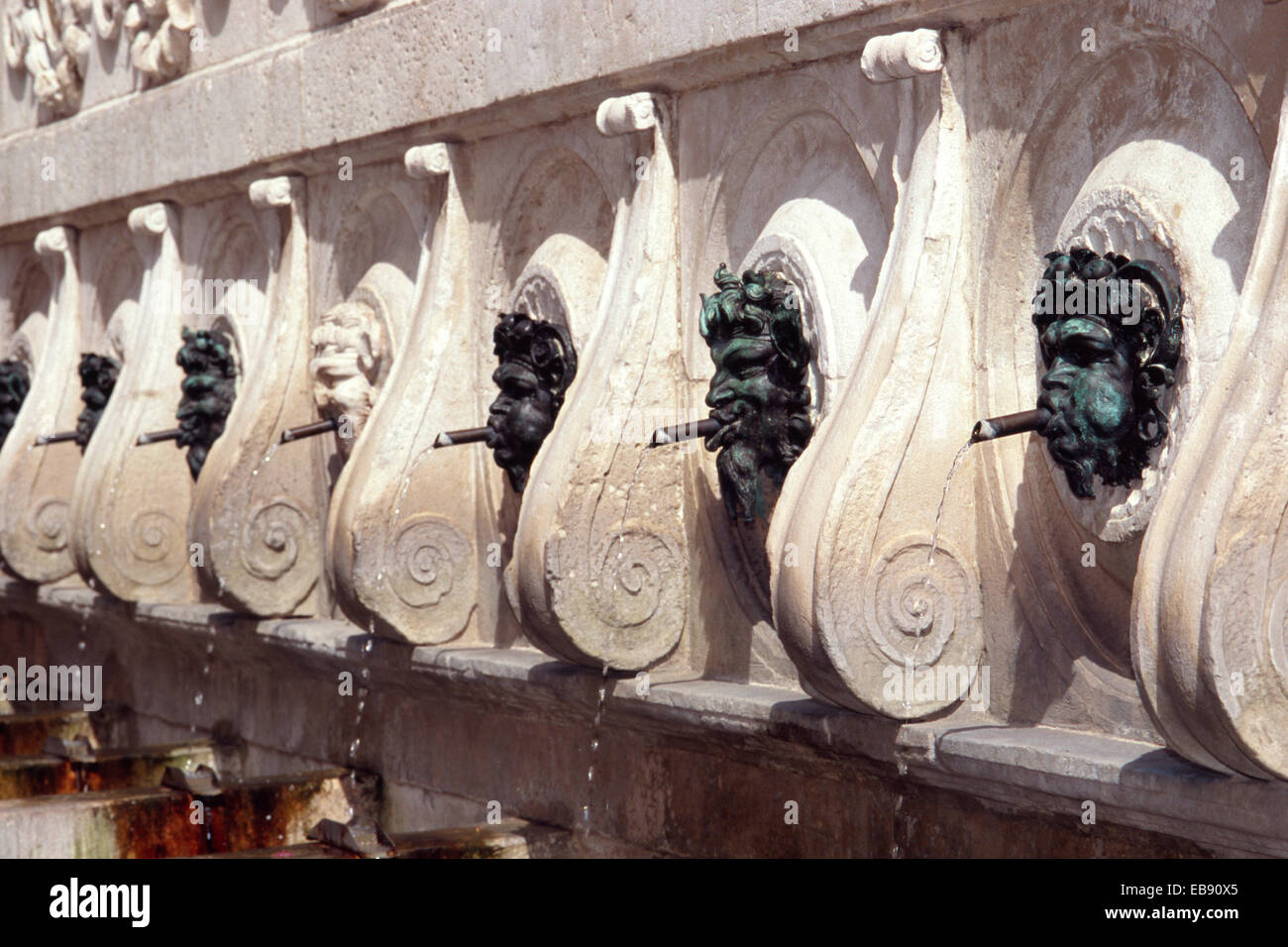 Italy, Marche, Ancona, Calamo Fountain, or Fountain of the Thirteen Spouts, Grotesque mask, designed by Pellegrino Tibaldi Stock Photo