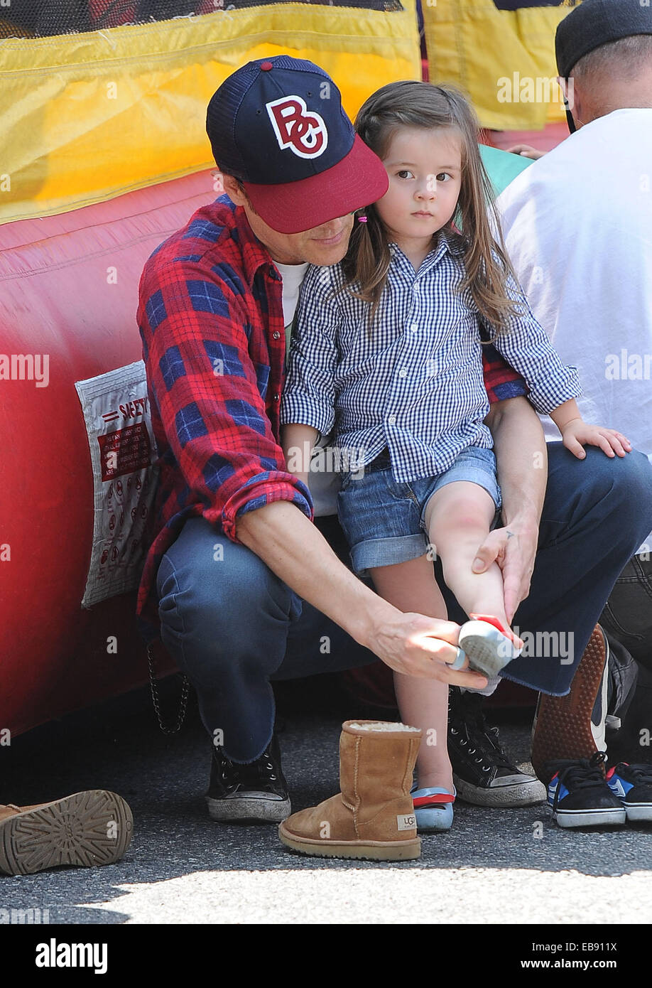 Johnny Knoxville spends time with his wife, Naomi Nelson and children,  Rocko and Arlo at the Farmers Market Featuring: Johnny Knoxville,Arlo Clapp  Where: Los Angeles, California, United States When: 25 May 2014
