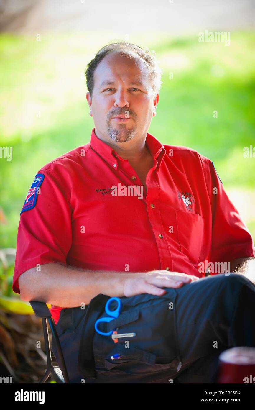 Portrait of male EMT, emergency medical technician, 46 years old, in