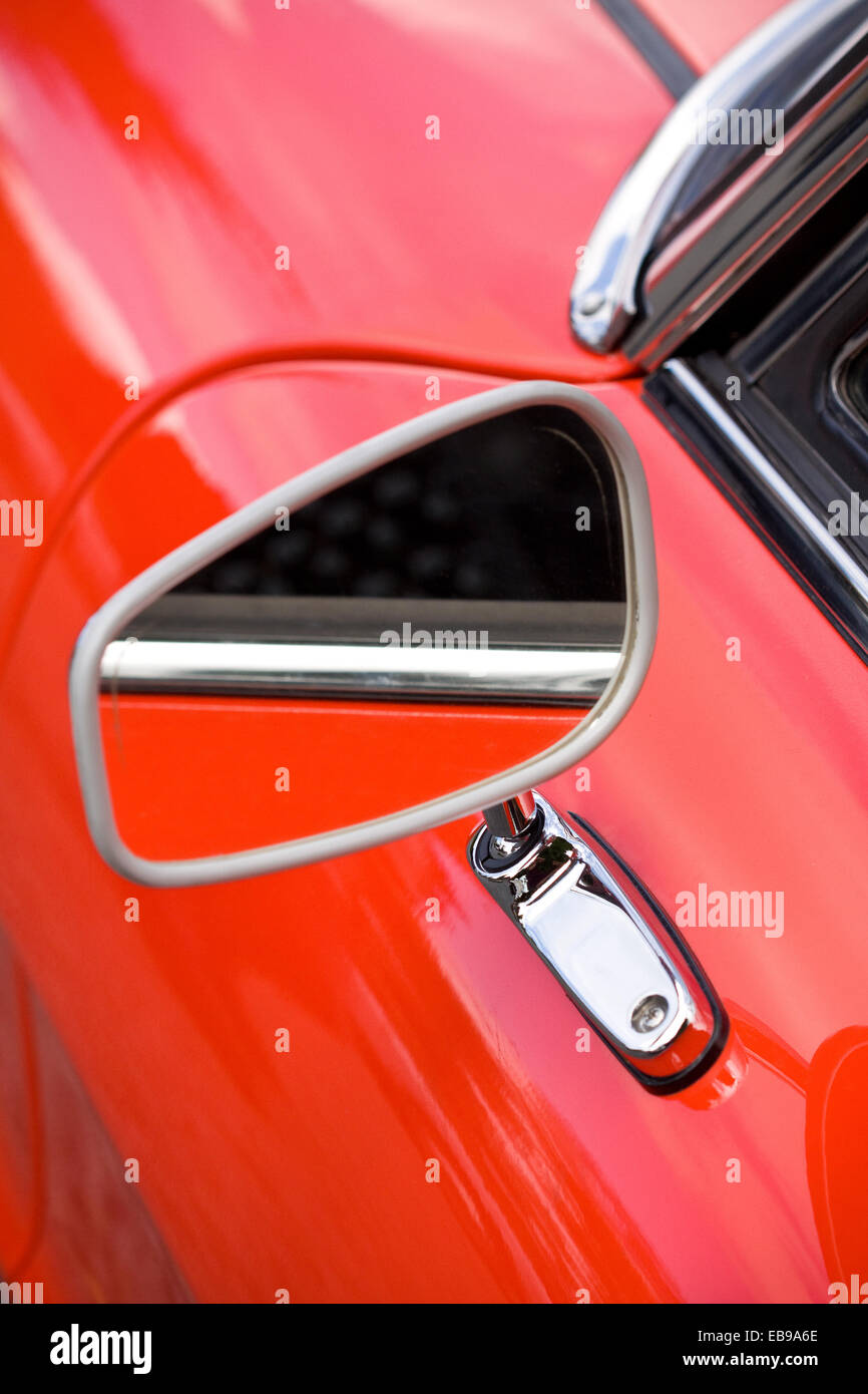 Closeup on vintage car rearview mirror, auto part Stock Photo