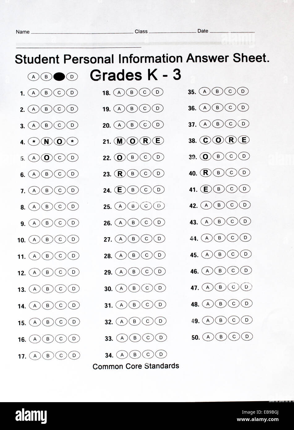 A photo of an test answer sheet spelling No More Core