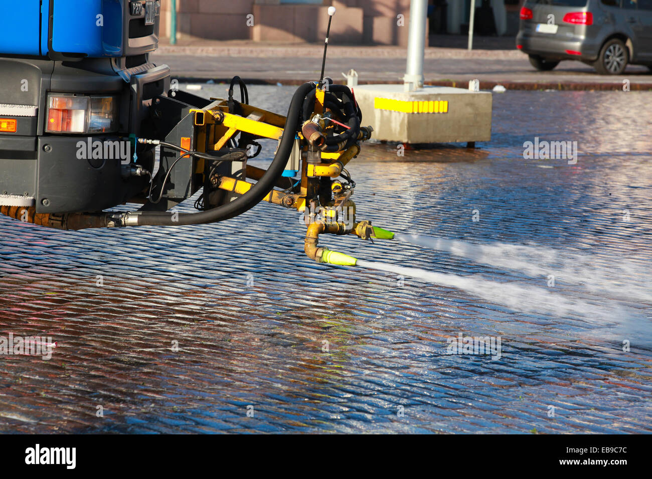 City street cleaning with water jets Stock Photo