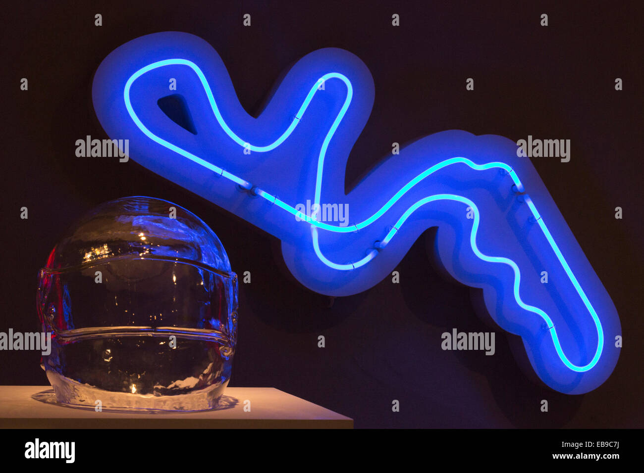 Glass helmet of a Formula 1 driver with neon signs. Angela Palmer's solo exhibition 'Adrenalin' at The Fine Art Society. Stock Photo