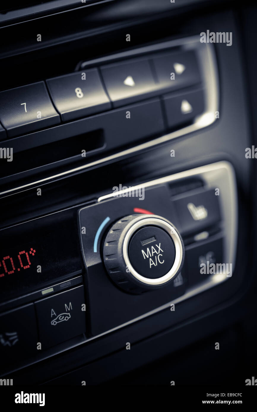 Color detail with the air conditioning button inside a car Stock Photo