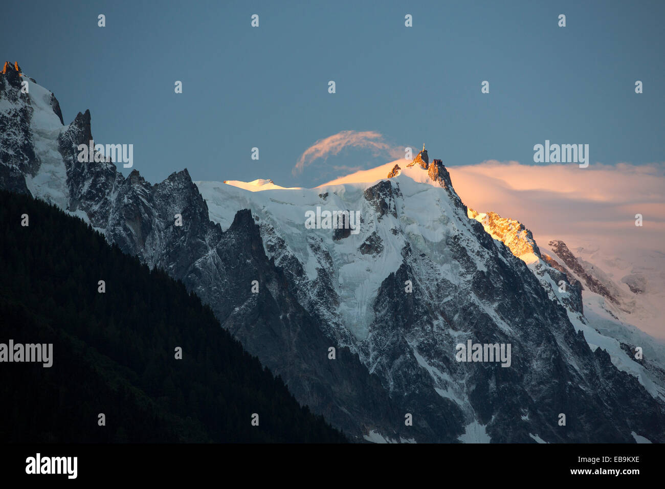 Dawn light on the Aiguille du midi in the Mont Blanc range above Chamonix, French Alps. Stock Photo