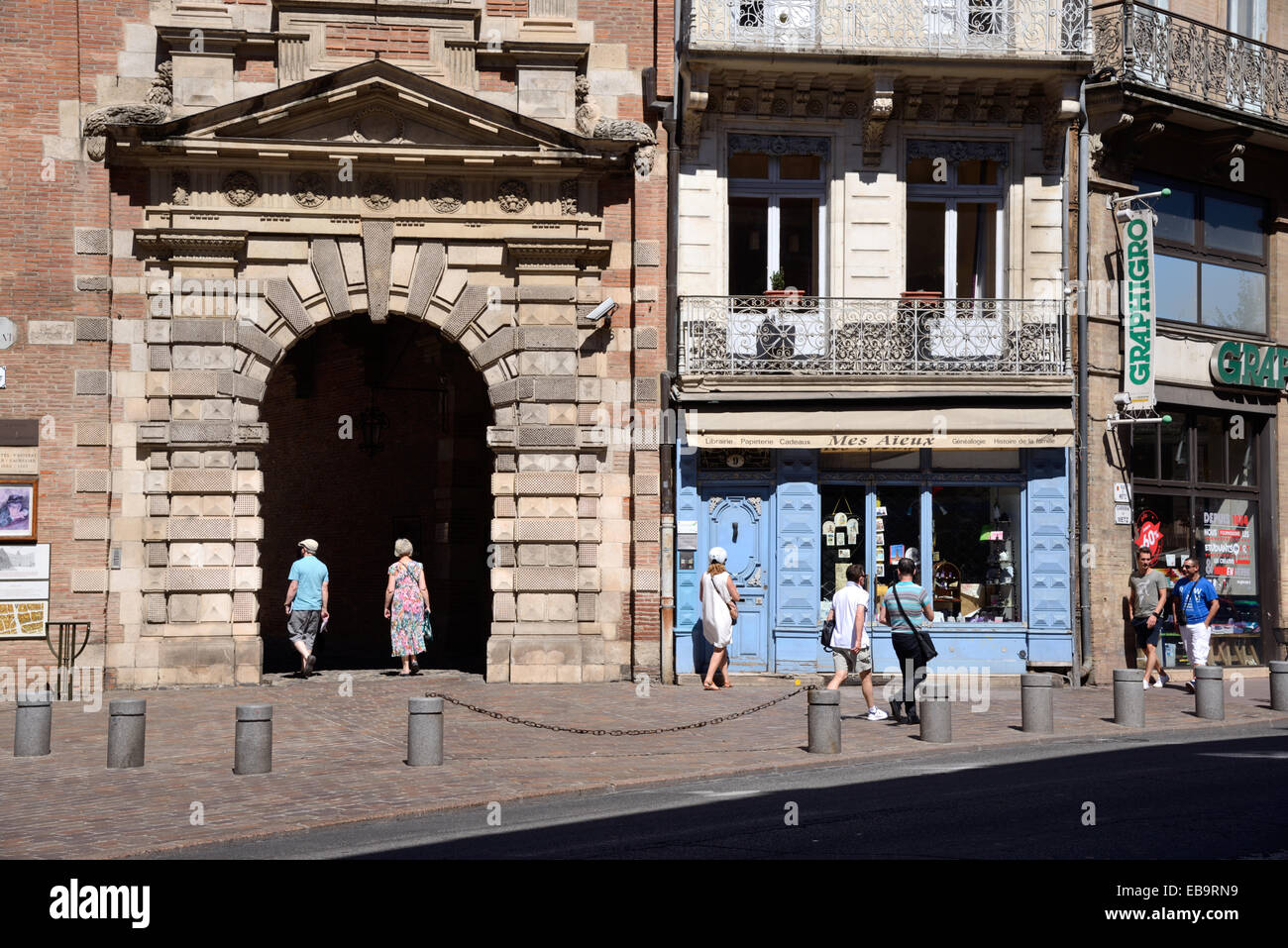 Tourists Walk Past Renaissance Entrance to the Assezat Palace or Hôtel d'Assezat, c16th, on Rue de Metz Equirol Toulouse  France Stock Photo