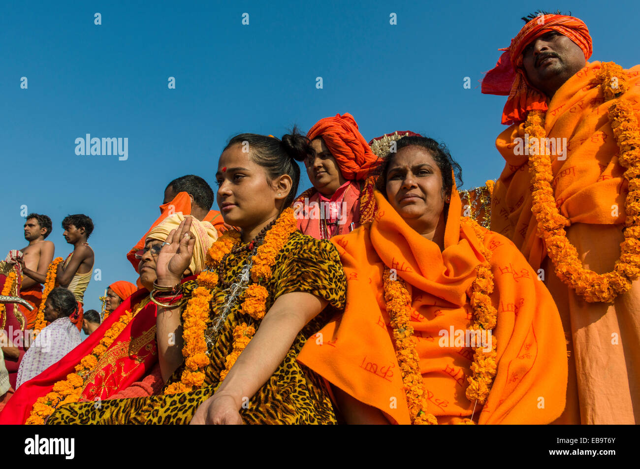 Group of sadhus, holy men, and sadhvis, holy women, participating in