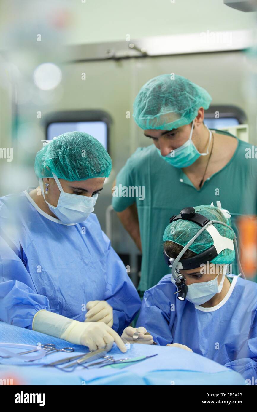 Tonsillectomy, Surgeons performing a tonsillectomy tonsil removal