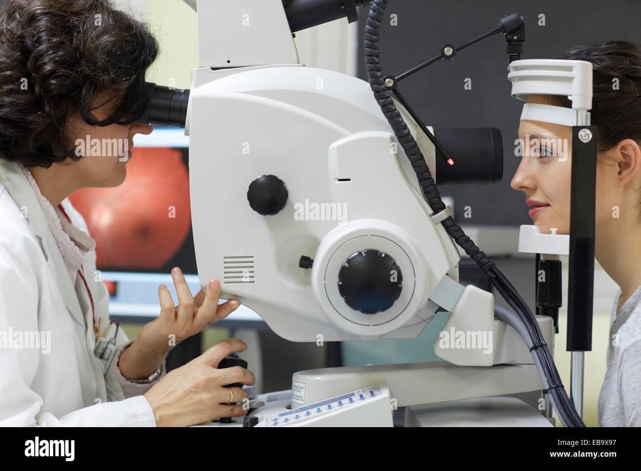 Eye examination Doctor using a retinal camera during an angiography