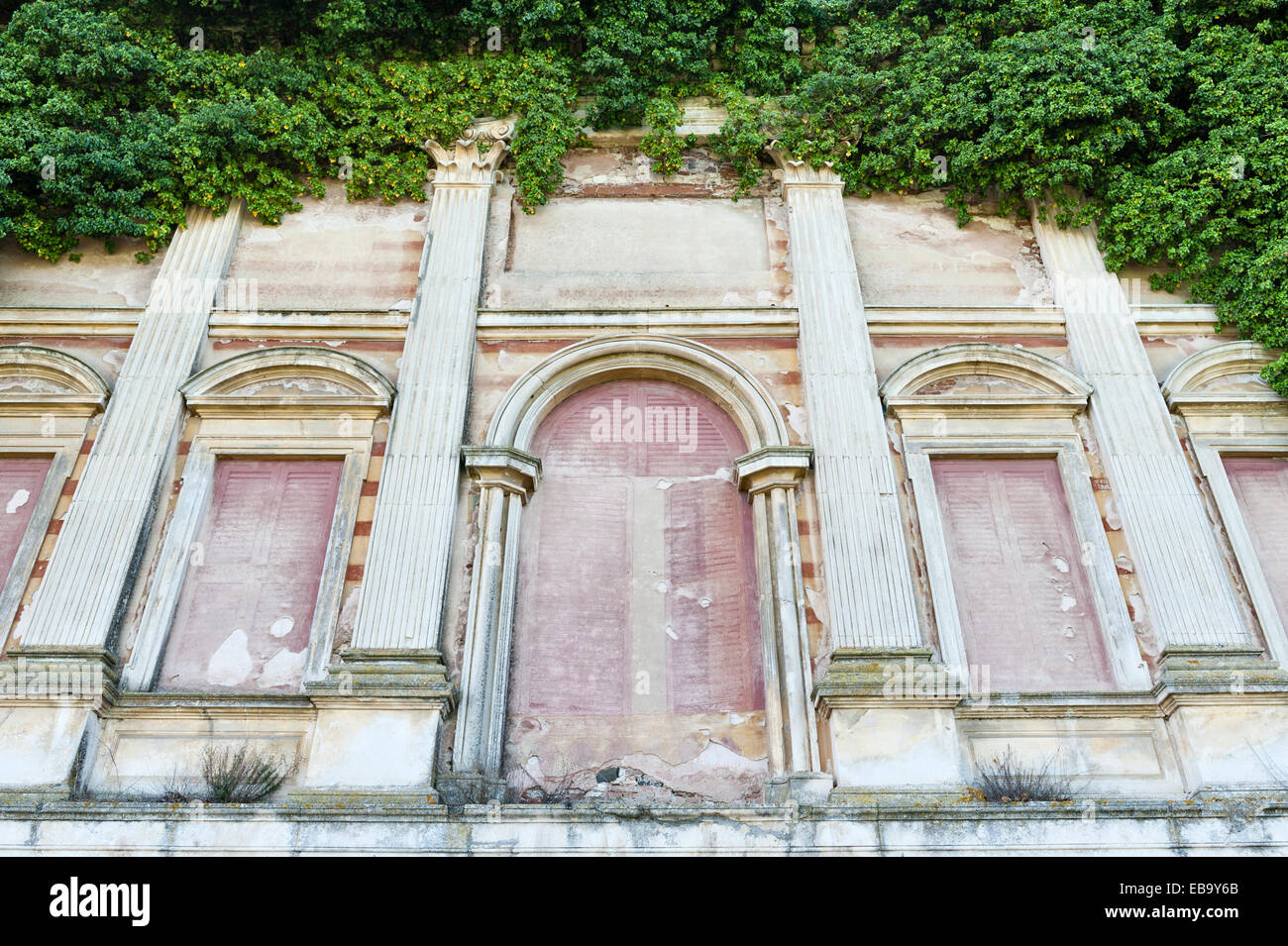 Villa Trissino Marzotto, Vicenza, Italy. Trompe l'oeil painted shutters on the facade of the ruined lower villa, destroyed by fire in 1841 Stock Photo