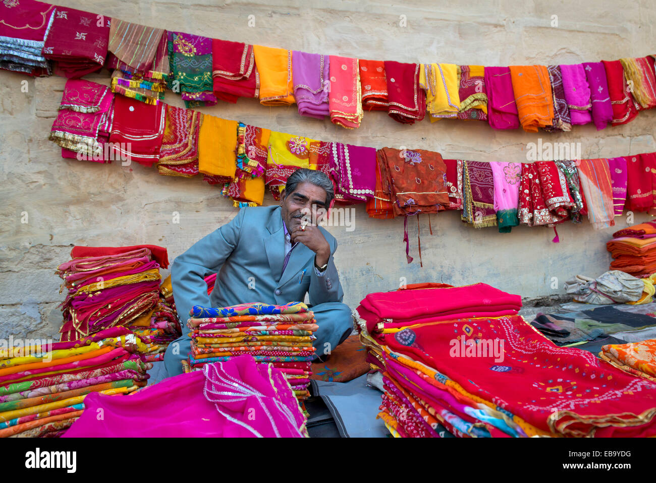 Fabric and cloth merchant at the market, Jodhpur, Rajasthan, India Stock Photo