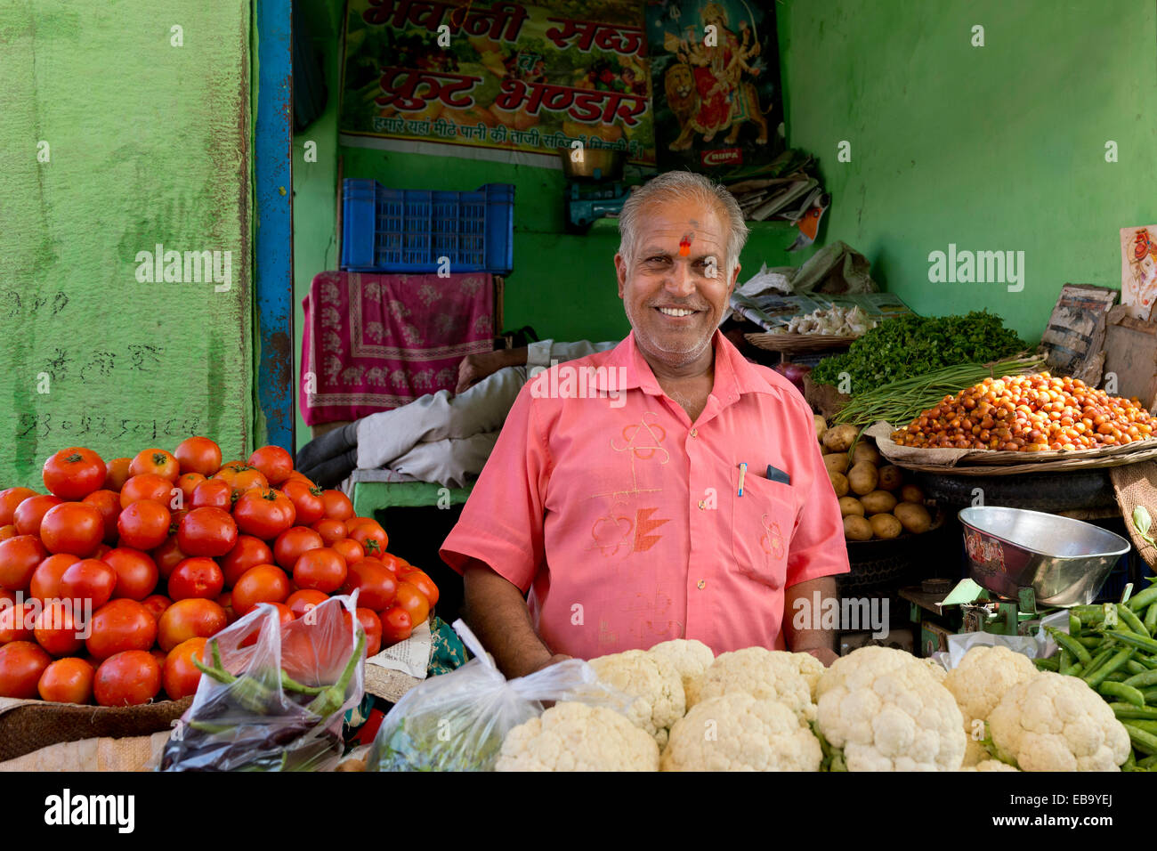 Smiling greengrocer, market, Jodhpur, Rajasthan, India Stock Photo