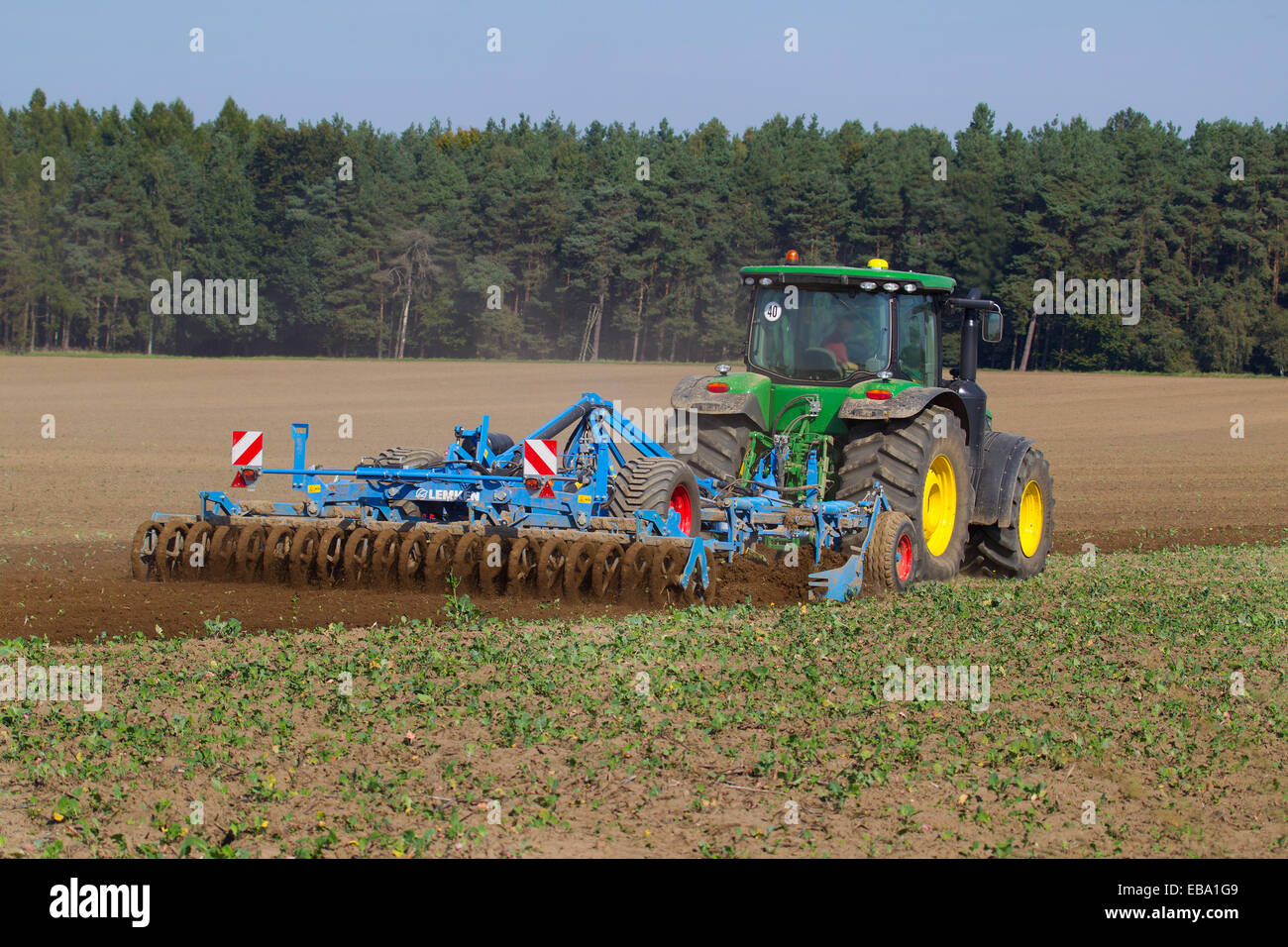 Cultivating a harvested field, Söllichau, Saxony-Anhalt, Germany Stock Photo