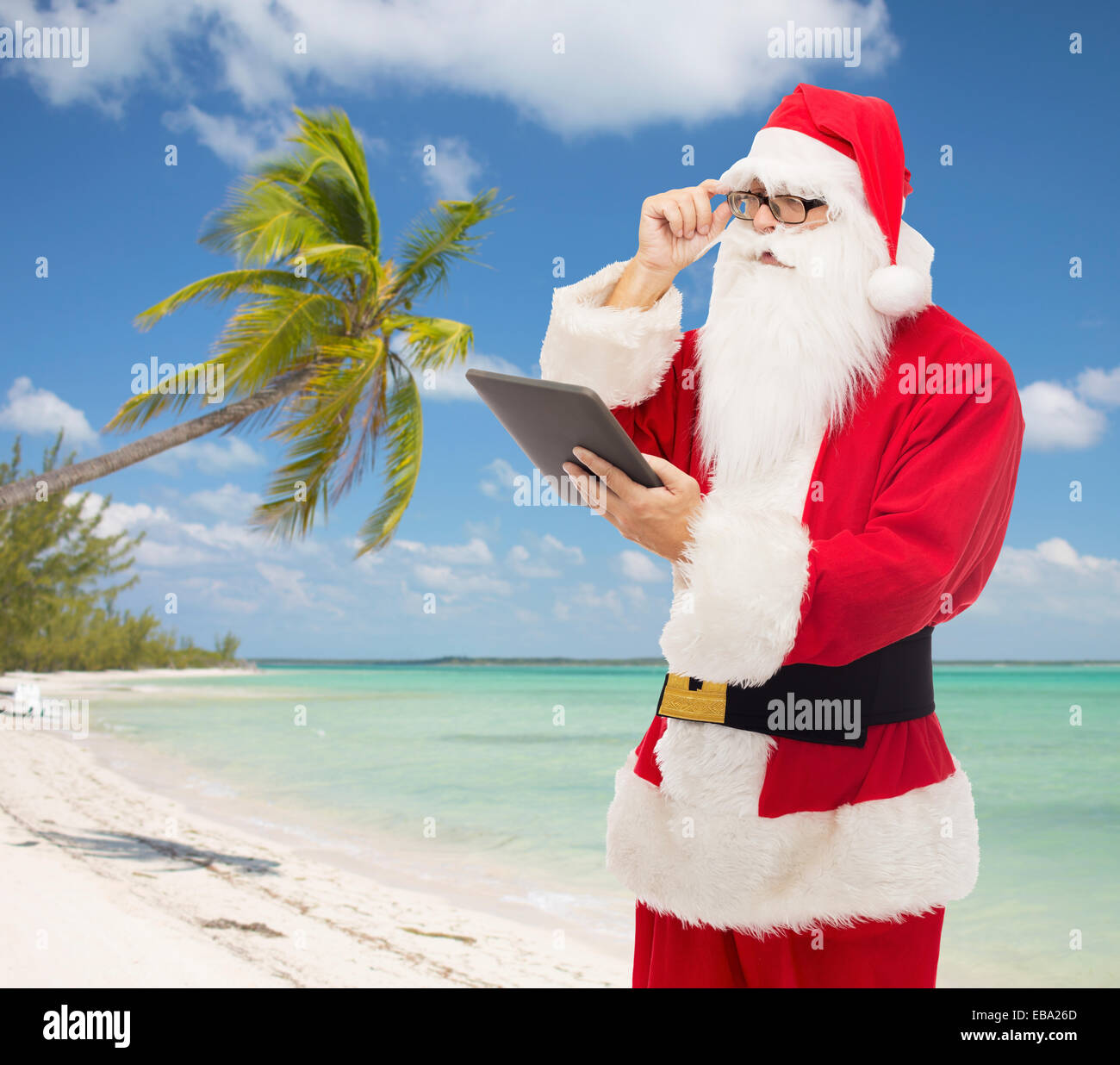 man in costume of santa claus with tablet pc Stock Photo - Alamy