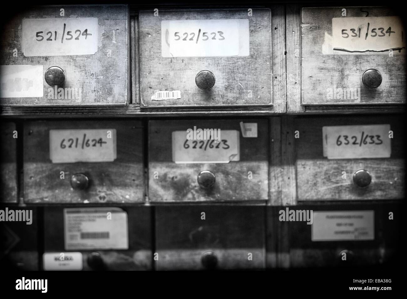 closeup of vintage furniture with drawers with numbers and references