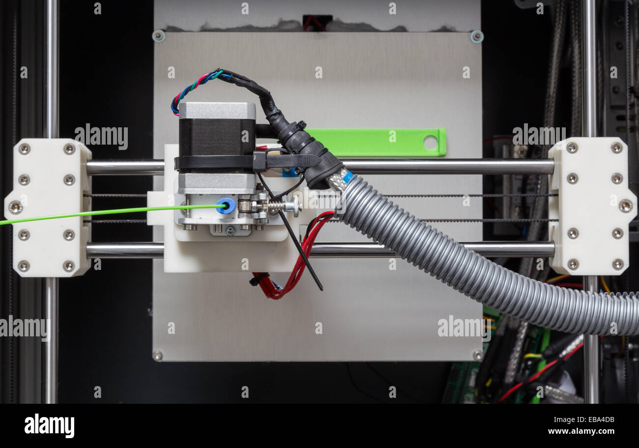 3d printer with bright green filament Stock Photo - Alamy