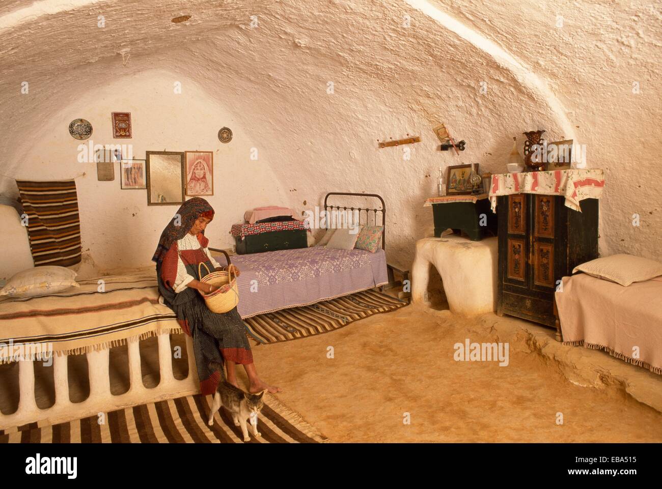 Fatima inside a cave house Matmata Southern Tunisia Stock Photo - Alamy