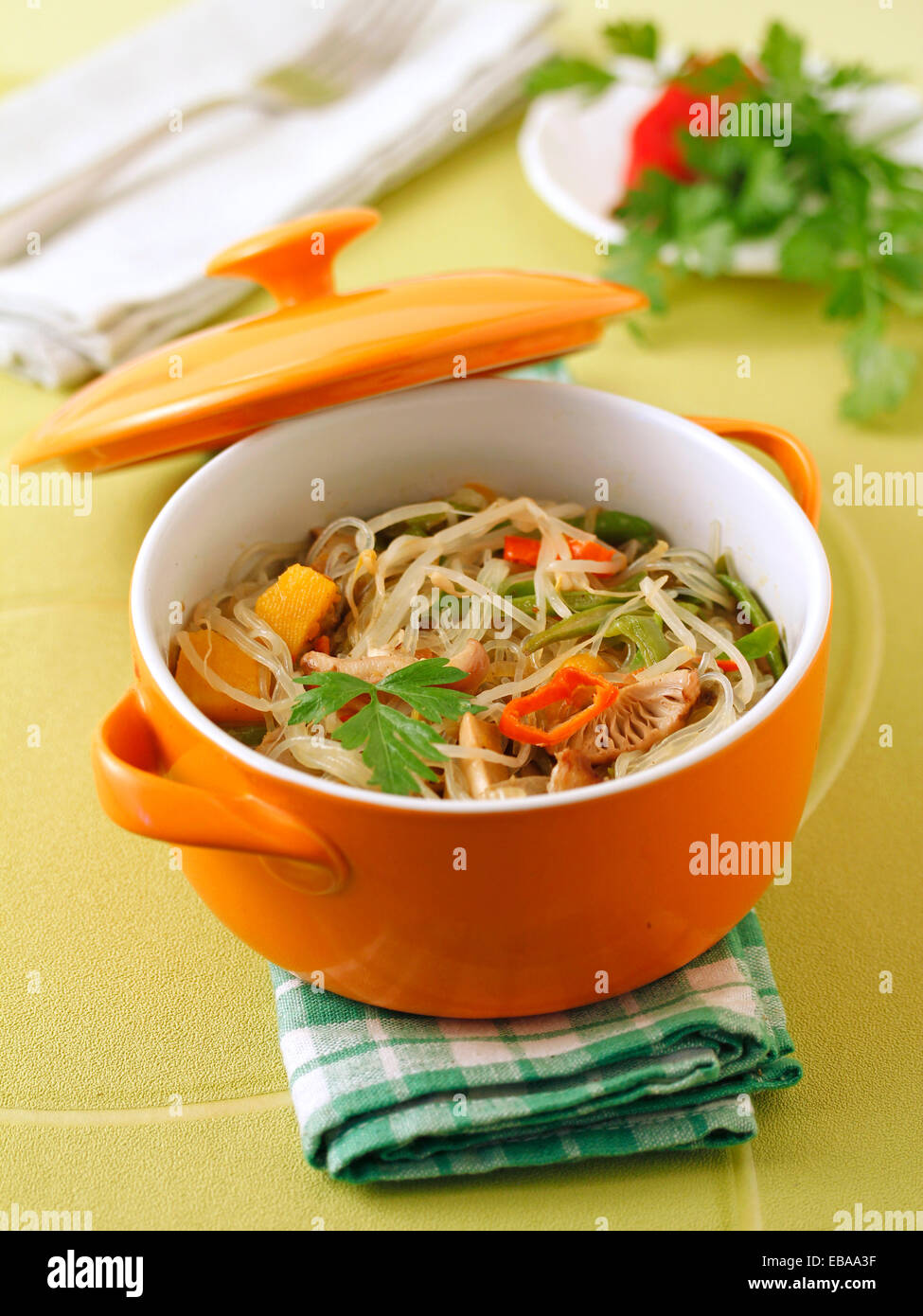 Rice noodles with vegetables. Recipe available. Stock Photo