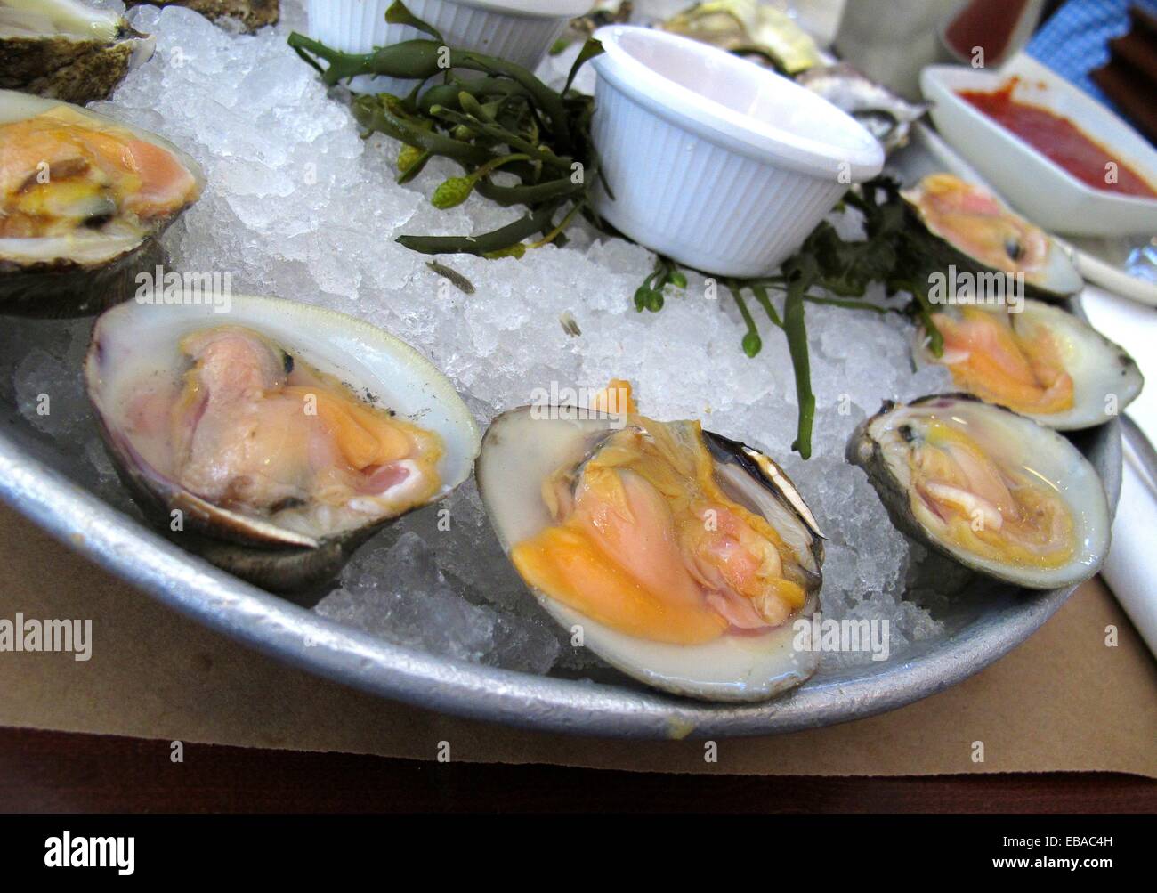 Happy hour menu top neck clams and oysters at City Crab restaurant