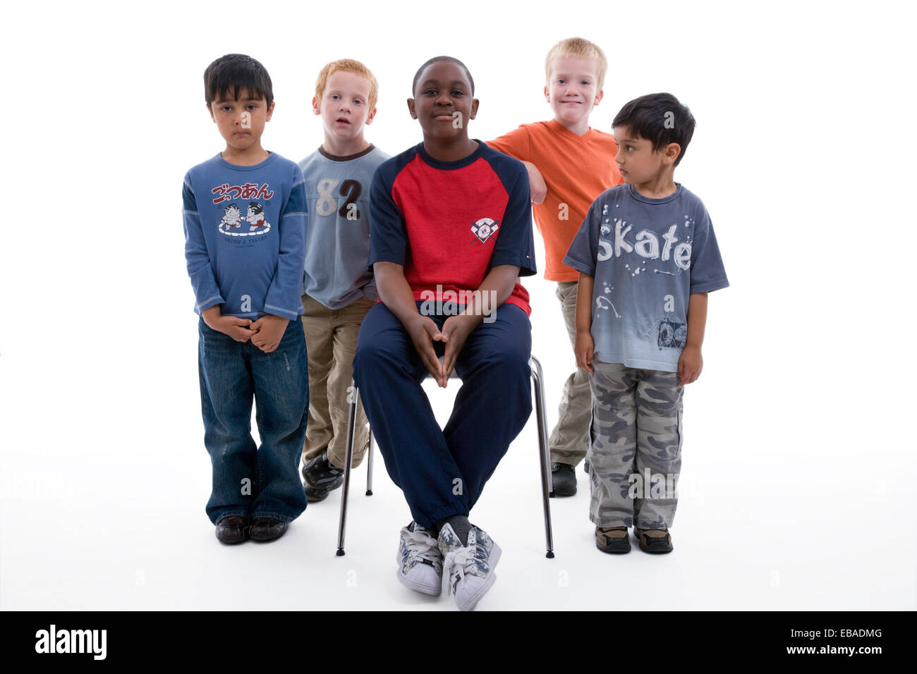 Multiracial group of boys in the studio Stock Photo - Alamy