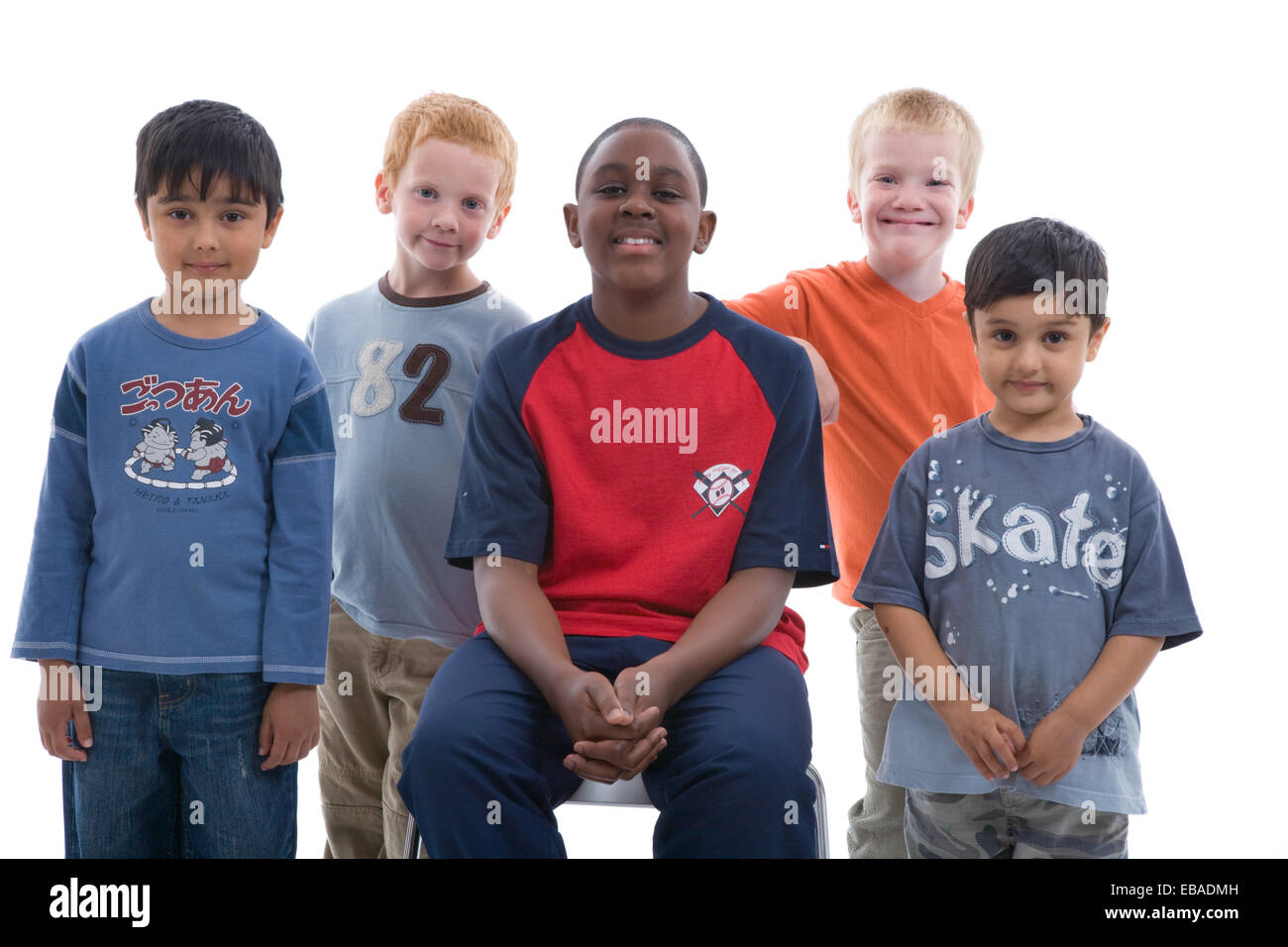 Multiracial group of boys in the studio Stock Photo - Alamy