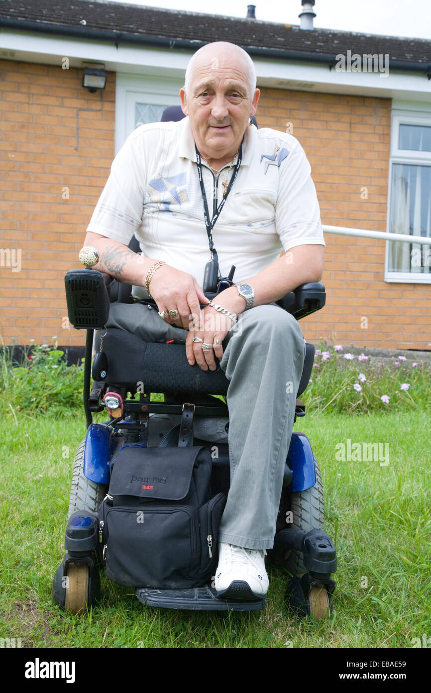 Male wheelchair user outside his house Stock Photo Alamy