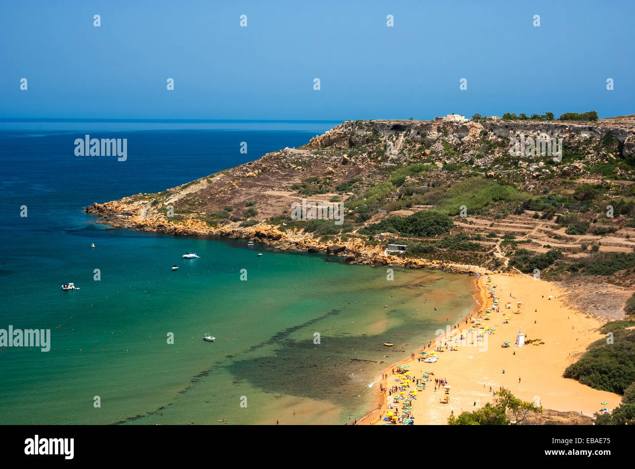 Stunning view over sandy beach at Ramla Bay in the northern part of the Gozo Island, one of the most popular beaches in Malta Stock Photo
