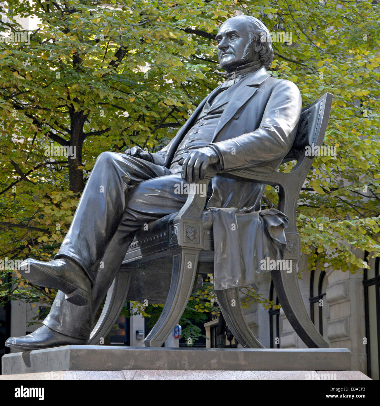 Statue of George Peabody an entrepreneur and philanthropist who founded the Peabody Trust housing association Stock Photo
