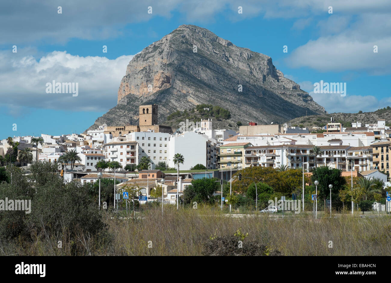 A view of the imposing Montgo mountain, with the town of Javea, Valencia, Spain in the foreground. Stock Photo