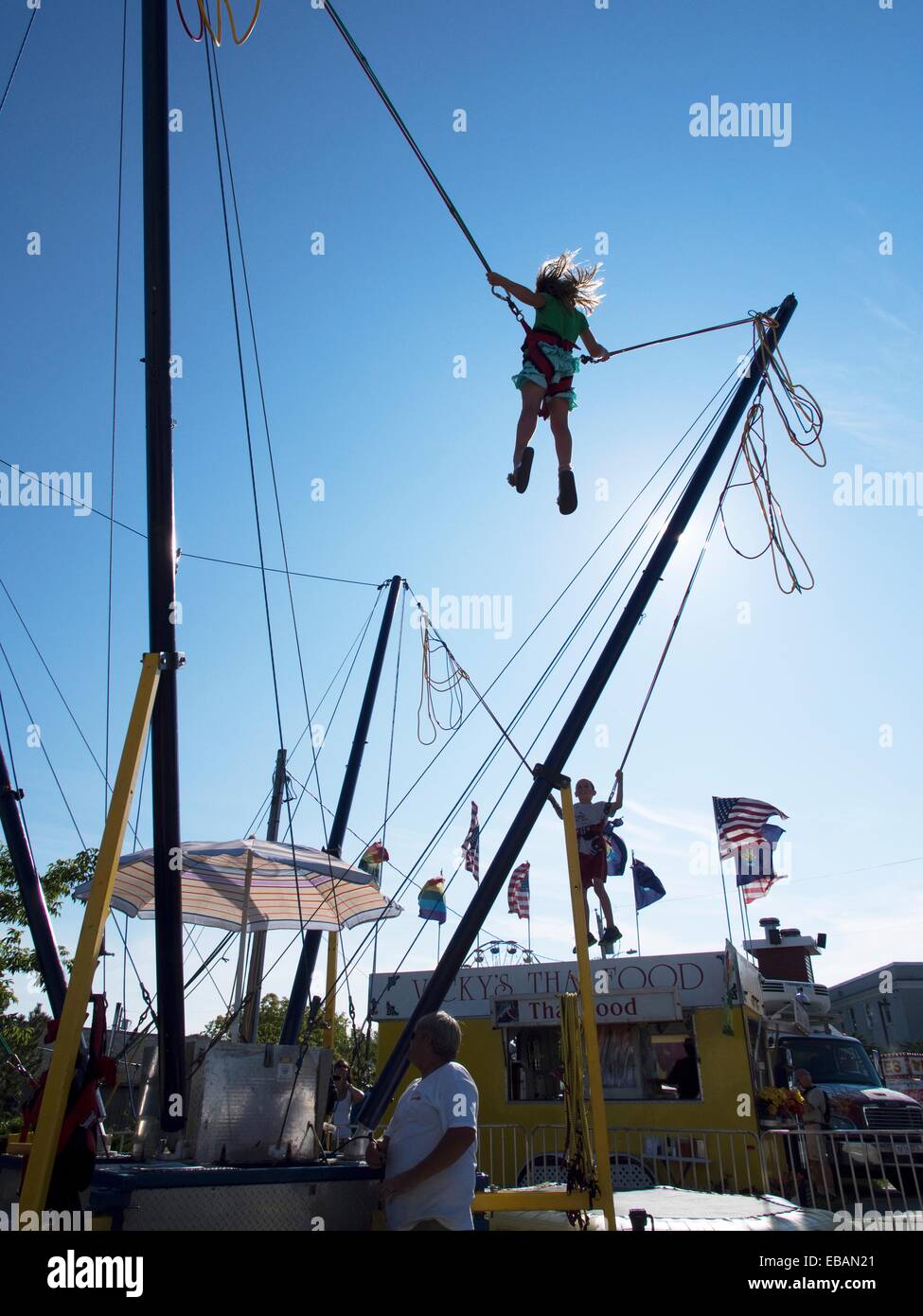 Kids on rope ride at the Maine Lobster Festival in Rockland, Maine
