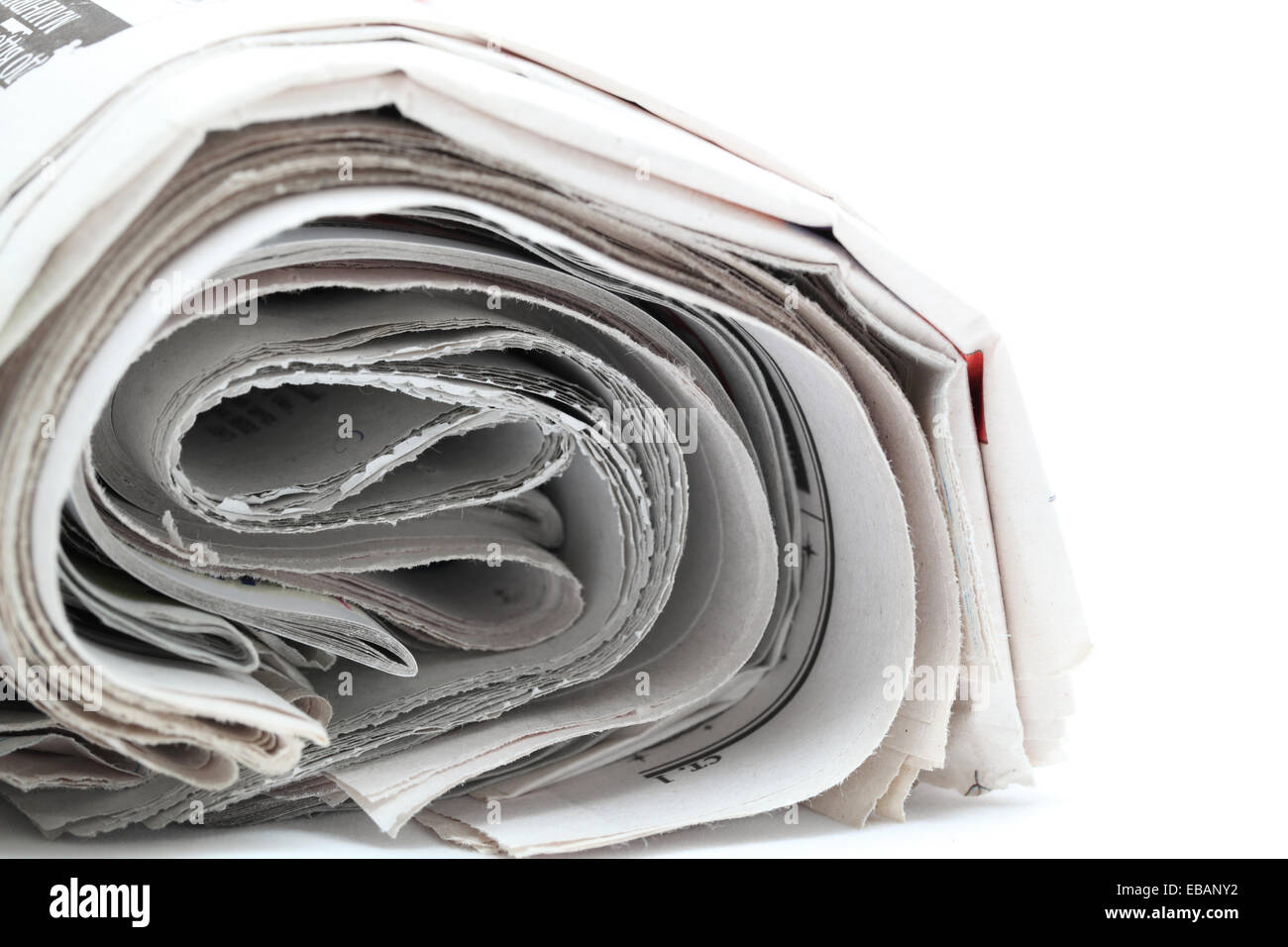 newspaper roll isolated on white background Stock Photo